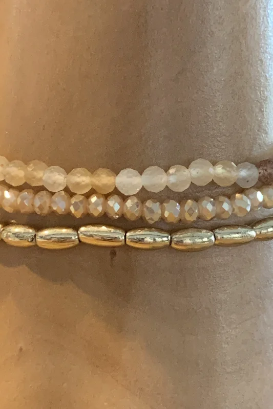 Semi Precious Three Strand Stretch Crystal And Gold Bracelet  Set